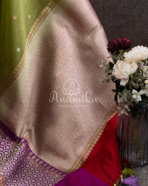 Parrot Green Banarasi Kora saree with stunning red border