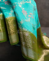 Aqua Color Chiniya Silk Pattu saree with contrast green border and pallu