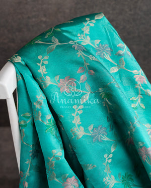 Aqua Color Chiniya Silk Pattu saree with contrast green border and pallu