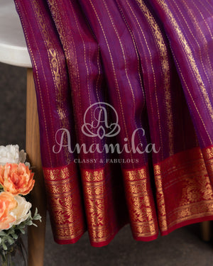 Purple Chander Silk saree with vertical zari lines and contrast red zari woven border