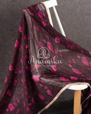 A georgette saree in black with beautiful floral prints