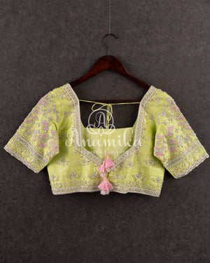 Kanjeevaram saree in a unique shade of pastel pink with pastel green