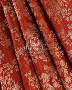 Kanjeevaram saree in a unique rust orange and brown combo