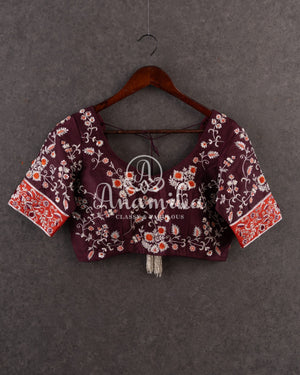 Kanjeevaram saree in a unique rust orange and brown combo