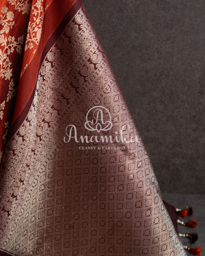 Kanjeevaram saree in a unique rust orange and brown combo