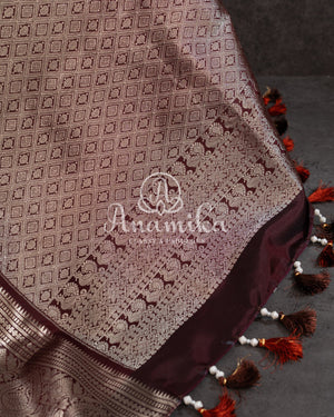 Kanjeevaram saree in a unique rust orange and brown combo