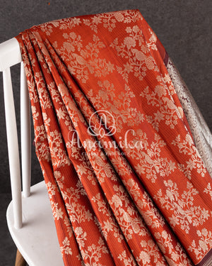 Kanjeevaram saree in a unique rust orange and brown combo