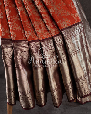 Kanjeevaram saree in a unique rust orange and brown combo