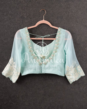 Pastel Blue Georgette saree with sequins floral embroidery and threadwork border