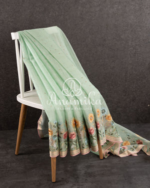 Pastel Green Organza saree with thread embroidered border