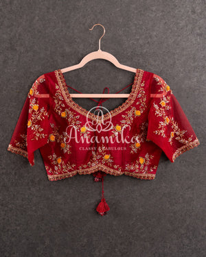 Red Blouse with intricate placement floral buttas.
