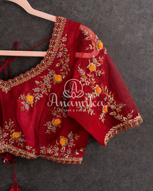 Red Blouse with intricate placement floral buttas.