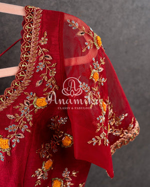 Red Blouse with intricate placement floral buttas.