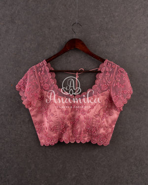 Dark Peach blouse in a stylish net overlay patter with all over self cutdana embroidery