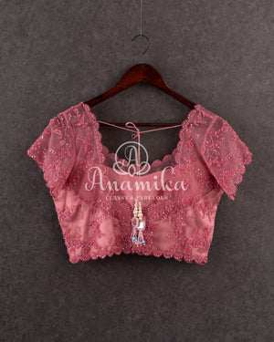 Dark Peach blouse in a stylish net overlay patter with all over self cutdana embroidery