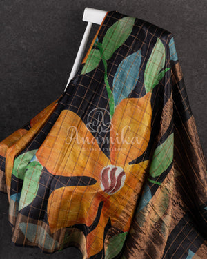 Tussar Saree in black with handpainting floral design, paired with orange ikkat rawsilk blouse
