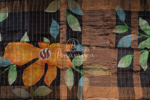 Tussar Saree in black with handpainting floral design, paired with orange ikkat rawsilk blouse