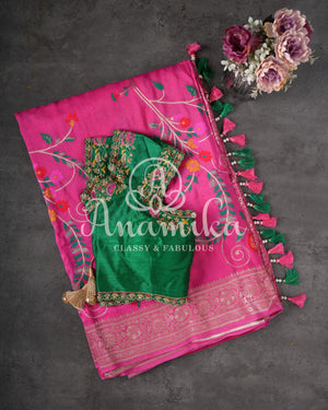 Pink Munga silk saree with all over floral vines and a contrast green handwork blouse