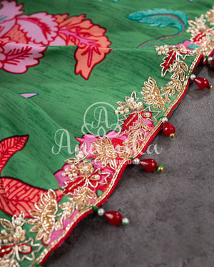 Floral Crepe Saree in Green with a handwork border and a contrast red blouse