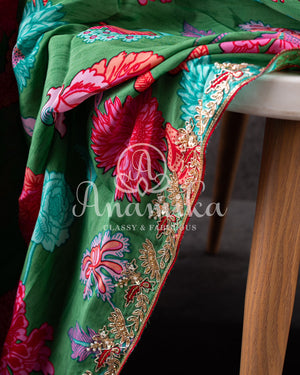Floral Crepe Saree in Green with a handwork border and a contrast red blouse