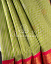 Gadwal pattu saree in a beautiful shade of parrot green and rose pink peach