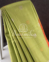 Gadwal pattu saree in a beautiful shade of parrot green and rose pink peach