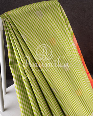 Gadwal pattu saree in a beautiful shade of parrot green and rose pink peach