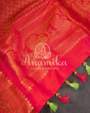 Gadwal pattu saree in a beautiful shade of parrot green and rose pink peach