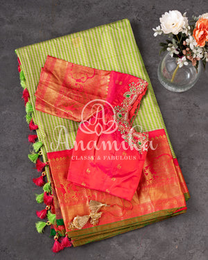 Gadwal pattu saree in a beautiful shade of parrot green and rose pink peach