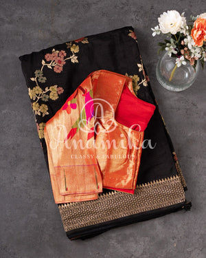 Black Munga silk saree paired with a pure paithani blouse