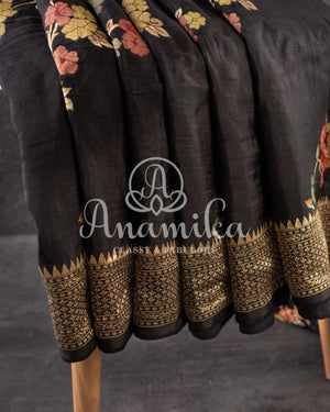 Black Munga silk saree paired with a pure paithani blouse