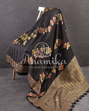 Black Munga silk saree paired with a pure paithani blouse