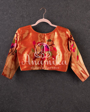 Black Munga silk saree paired with a pure paithani blouse