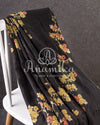 Black Munga silk saree paired with a pure paithani blouse