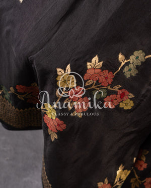 Black Munga silk saree paired with a pure paithani blouse