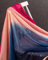 Stunning multi color shaded chiffon saree with a heavily embroidered blouse