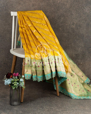 Breath taking Banarasi saree in Yellow/Blue with maggam work border