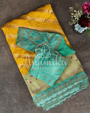 Breath taking Banarasi saree in Yellow/Blue with maggam work border