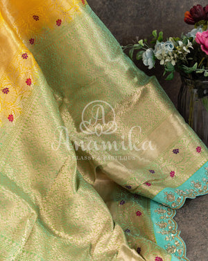 Breath taking Banarasi saree in Yellow/Blue with maggam work border