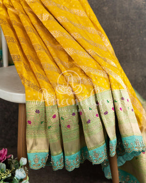 Breath taking Banarasi saree in Yellow/Blue with maggam work border