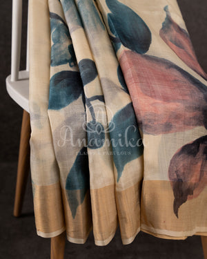 Tussar Saree with handpainting floral design, paired with peacock blue ikkat rawsilk blouse