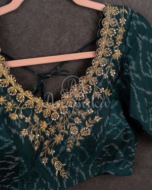 Tussar Saree with handpainting floral design, paired with peacock blue ikkat rawsilk blouse