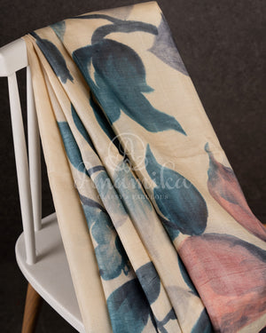 Tussar Saree with handpainting floral design, paired with peacock blue ikkat rawsilk blouse