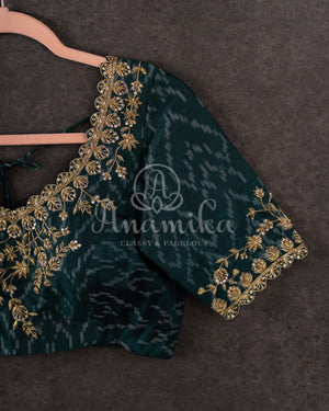 Tussar Saree with handpainting floral design, paired with peacock blue ikkat rawsilk blouse