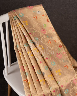 Beige zari kota saree with all over jaal design and muniya inspired border