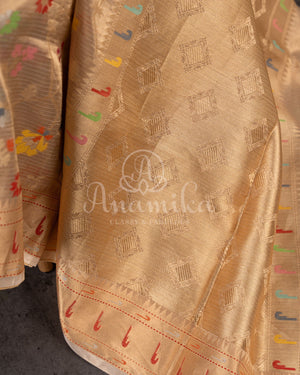 Beige zari kota saree with all over jaal design and muniya inspired border