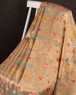 Beige zari kota saree with all over jaal design and muniya inspired border