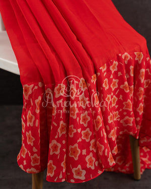 Red Floral Georgette ruffle saree with a stylish sleeveless blouse