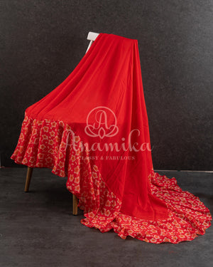 Red Floral Georgette ruffle saree with a stylish sleeveless blouse