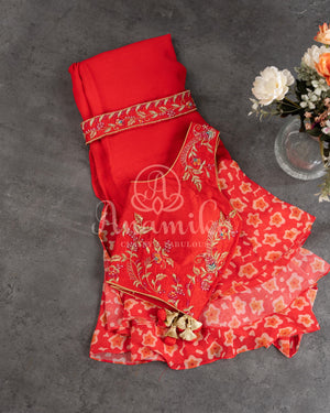 Red Floral Georgette ruffle saree with a stylish sleeveless blouse